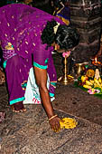 Worship and puja offerings inside the Swamimalai temple. 